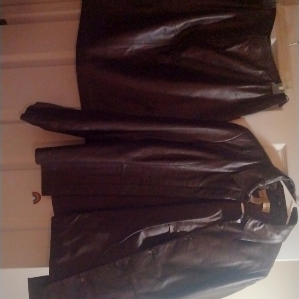 Leather suit.. skirt and jacket. Size 14. Brand name apostrophe ...colorBrown